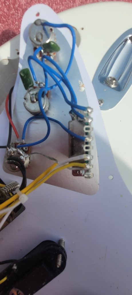 HSS Wiring on a Cheap Stratocaster Copy. This wiring uses a 5 Way Switching Mechanism
