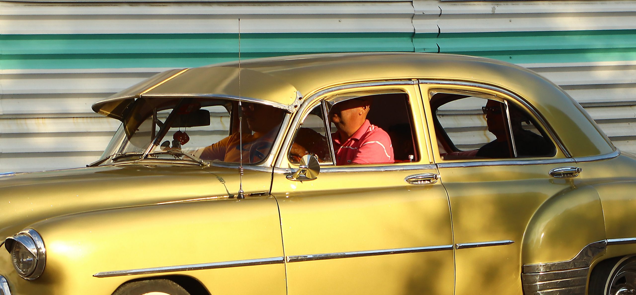 Occupants of the Golden Car in Havana, Cuba.